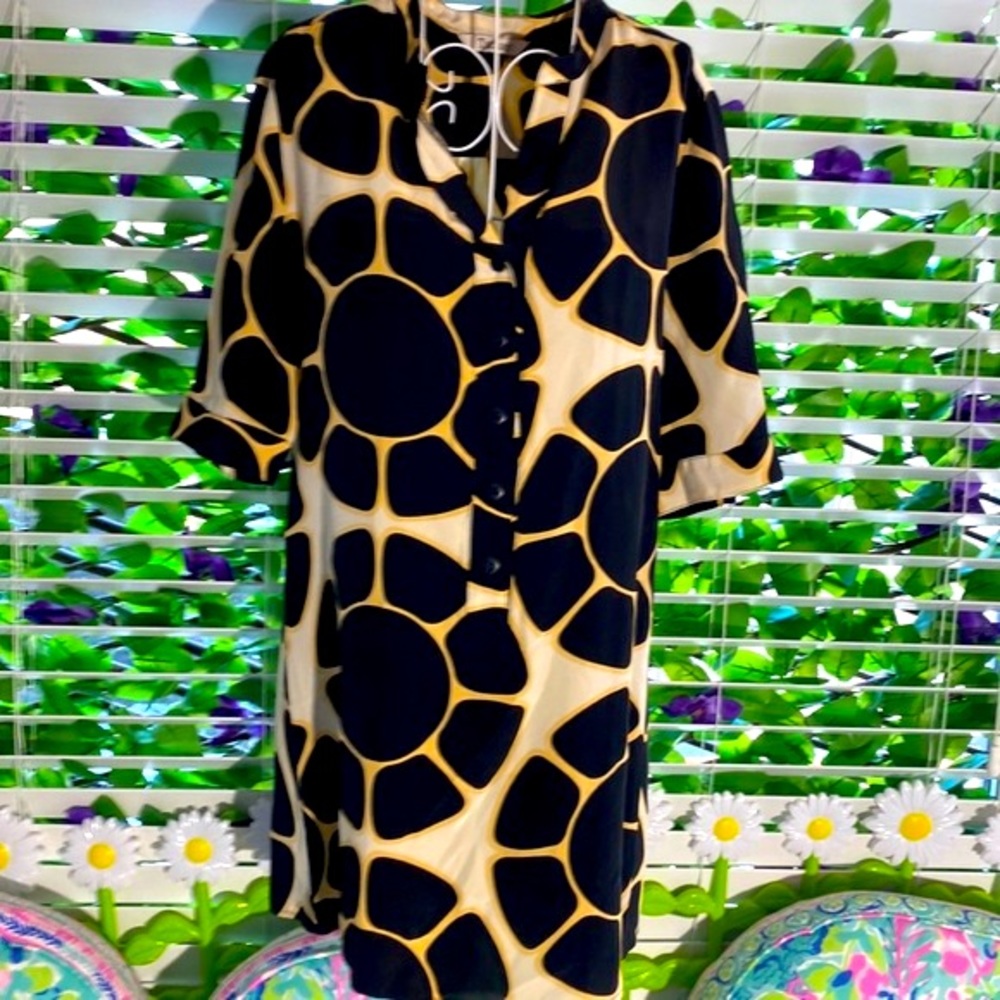 Tucker silk dress with bold black and yellow floral print on cream background